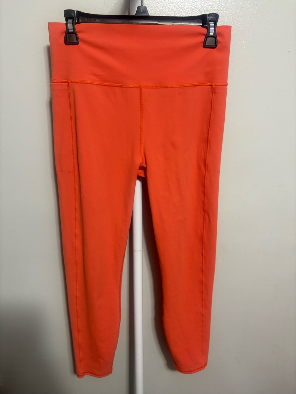 Vuori High-Rise Active Leggings in Vibrant Coral Orange